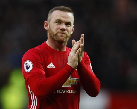 Rooney slams 'disgraceful' treatment over photos